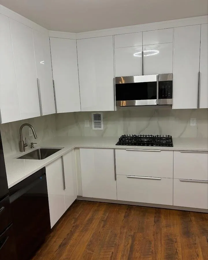 Restored kitchen with white cabinets after water damage in Enterprise